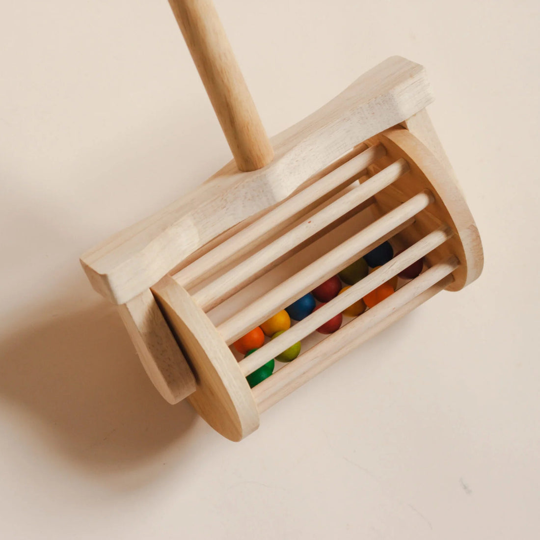 Q Toys Mower Push Toy, wooden push mower with colored balls that tumble inside the drum