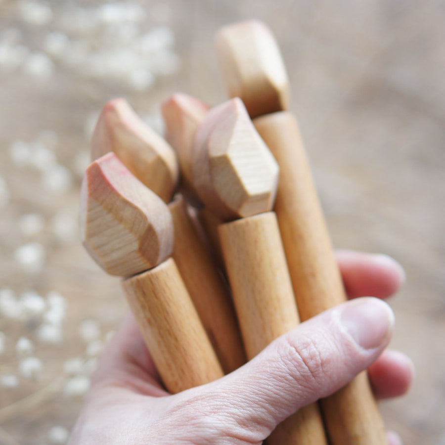 Wooden birthday candle with a carved flame, included in the birthday ring set