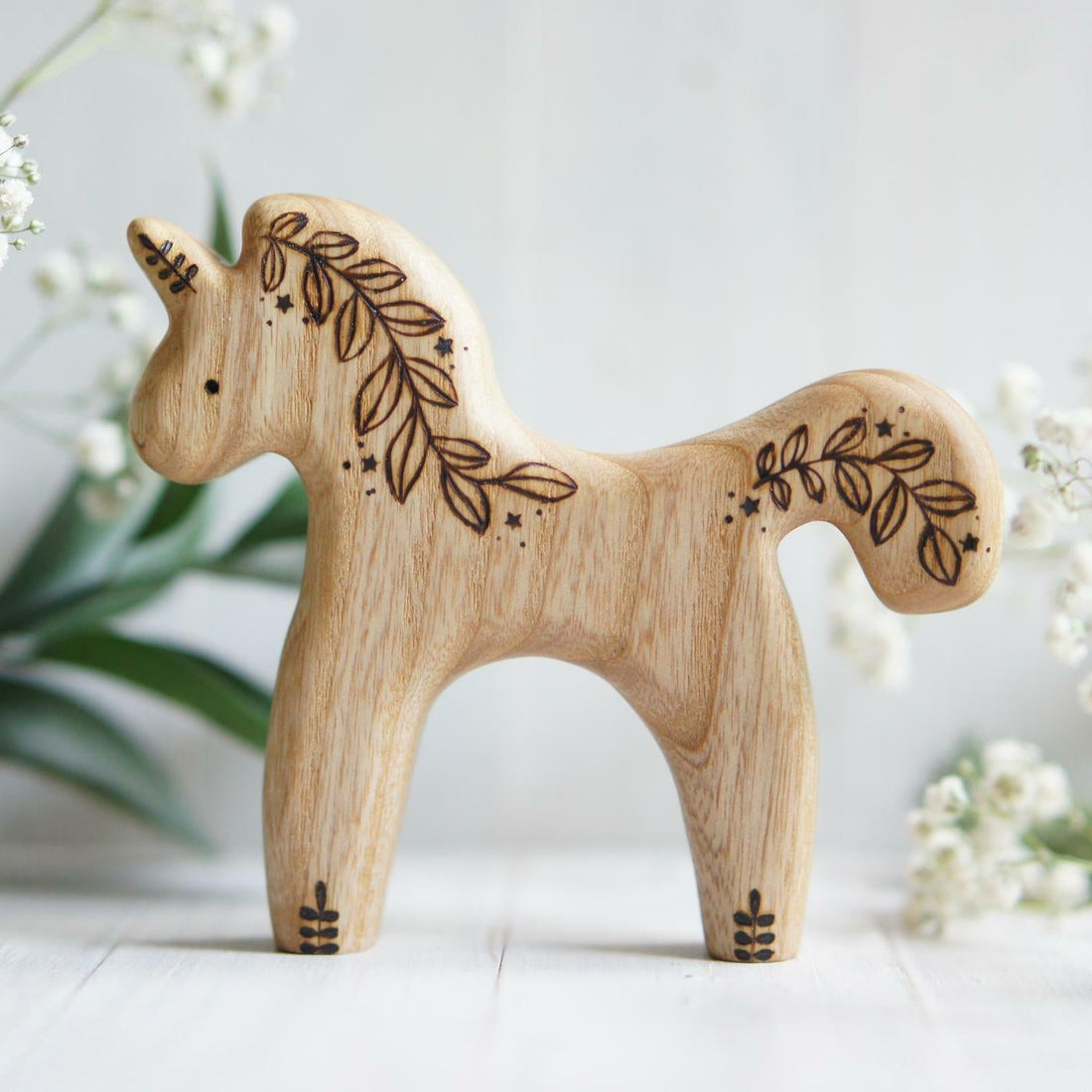 Wooden Unicorn Toy, Flower, a hand-carved wooden toy by Tiny Fox Hole.