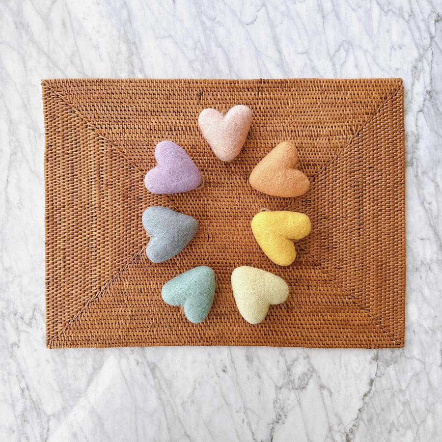 Felt Pastel Heart Ornaments – Set of 7 Wool Decorations, a wool felt ornament by Ganapati Crafts Co., needle-felted and hand-stitched in Nepal
