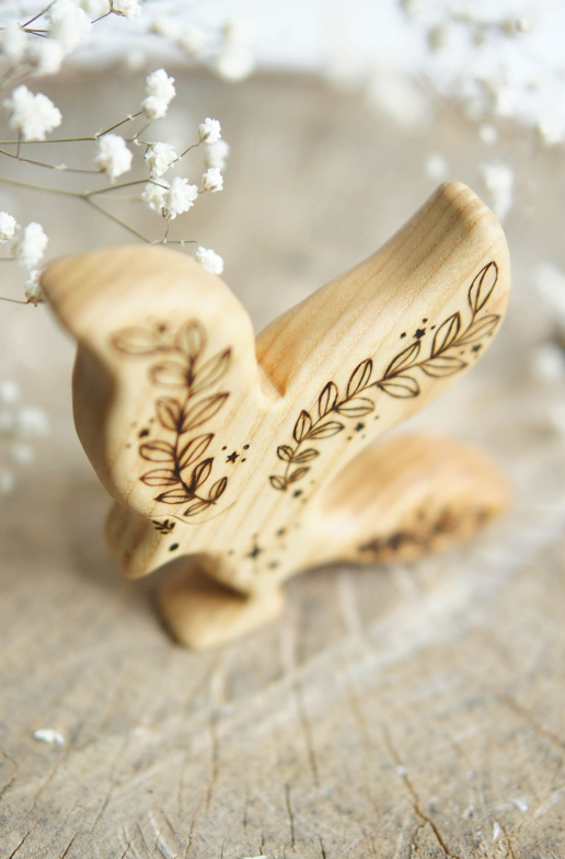 Wooden Phoenix, a hand-carved wooden toy by Tiny Fox Hole.