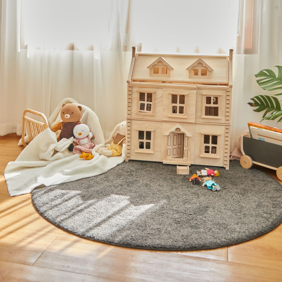 Plan toys doll offers house