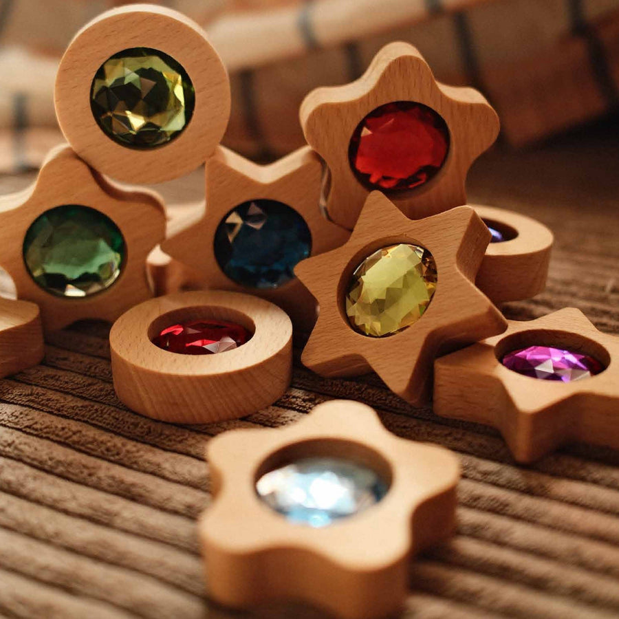 Bauspiel wooden star, flower and round play coins with sparkling stones