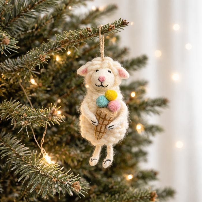 Handmade felt sheep ornament holding an ice cream cone