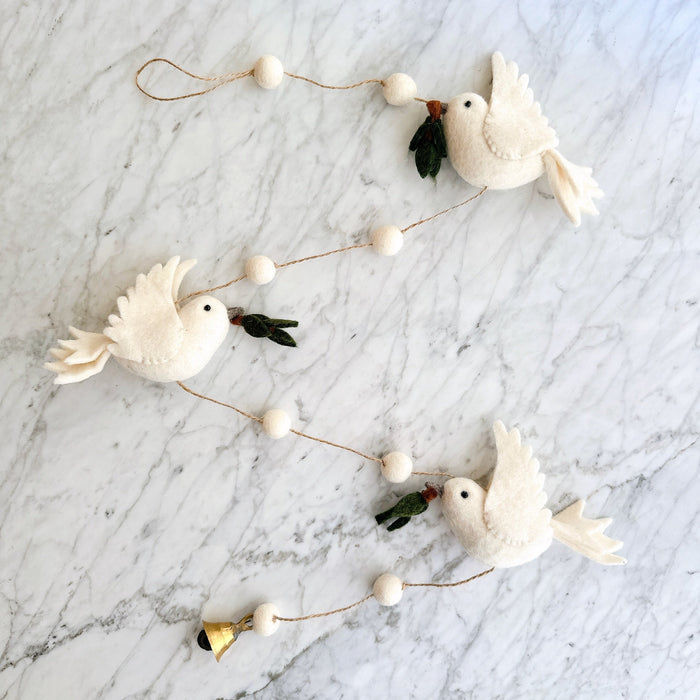 Handmade felt garland with white doves and olive twigs