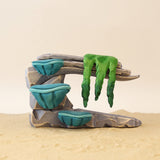 Wooden coral ledge in gray with turquoise coral cups growing from it at three heights · view 1