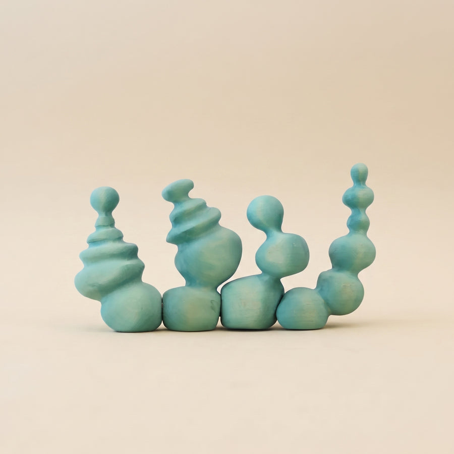 Wooden coral in soft mint green, a cluster of rounded columns stacked in bulbs