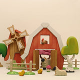 Third view of the wooden windmill showing the tower and base · view 3