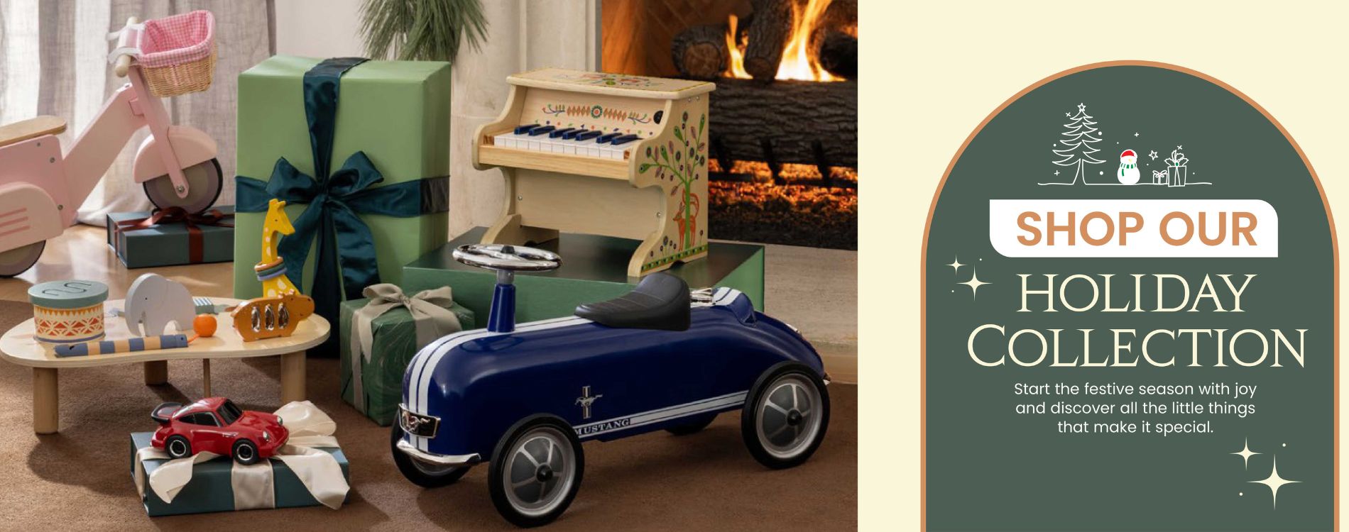 Children's toys including a toy car and piano in a festive setting with gift boxes and a fireplace.
