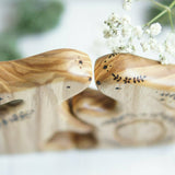 Hand-carved wooden bunny family announcement puzzle, two grown bunnies and a baby tucked into the belly, by Tiny Fox Hole · view 4