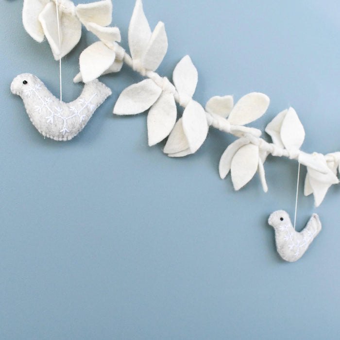 Felt doves and leaves garland, grey doves hanging beneath cream wool felt leaves
