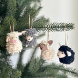 Felt Mini Sheep Ornament, a wool felt ornament by Ganapati Crafts Co., needle-felted and hand-stitched in Nepal · view 1
