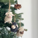 Felt Mini Sheep Ornament, a wool felt ornament by Ganapati Crafts Co., needle-felted and hand-stitched in Nepal (view 2) · view 2