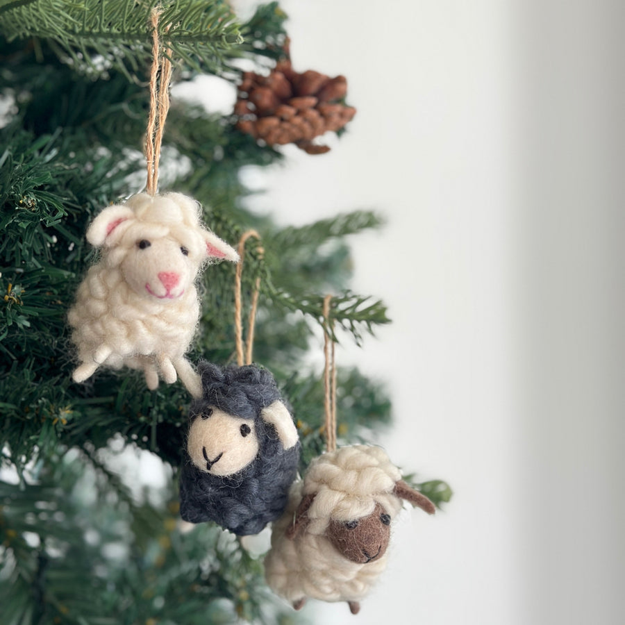 Felt Mini Sheep Ornament, a wool felt ornament by Ganapati Crafts Co., needle-felted and hand-stitched in Nepal (view 2)