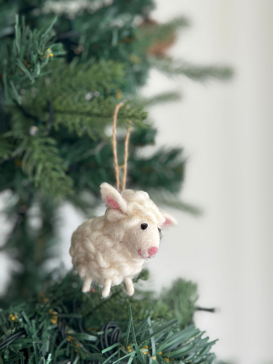 Felt Mini Sheep Ornament, a wool felt ornament by Ganapati Crafts Co., needle-felted and hand-stitched in Nepal (view 3)