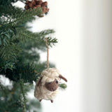 Felt Mini Sheep Ornament, a wool felt ornament by Ganapati Crafts Co., needle-felted and hand-stitched in Nepal (view 4) · view 4