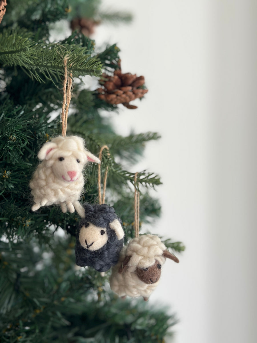 Felt Mini Sheep Ornament, a wool felt ornament by Ganapati Crafts Co., needle-felted and hand-stitched in Nepal (view 6)