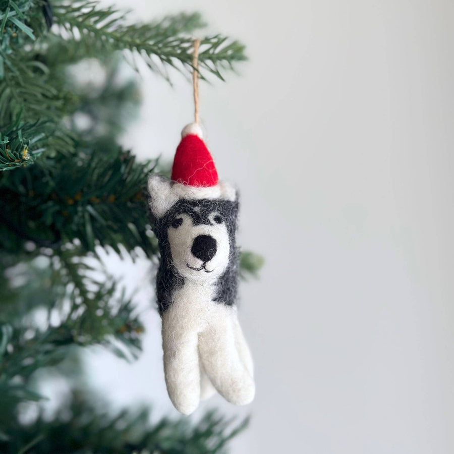 Felt Ornament - Husky with Christmas Hat, a wool felt ornament by Ganapati Crafts Co., needle-felted and hand-stitched in Nepal (view 2)