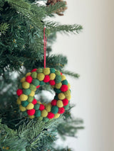 Felt Ornament - Mini Pompom Pompom Wreath, a wool felt ornament by Ganapati Crafts Co., needle-felted and hand-stitched in Nepal (view 4) · view 4