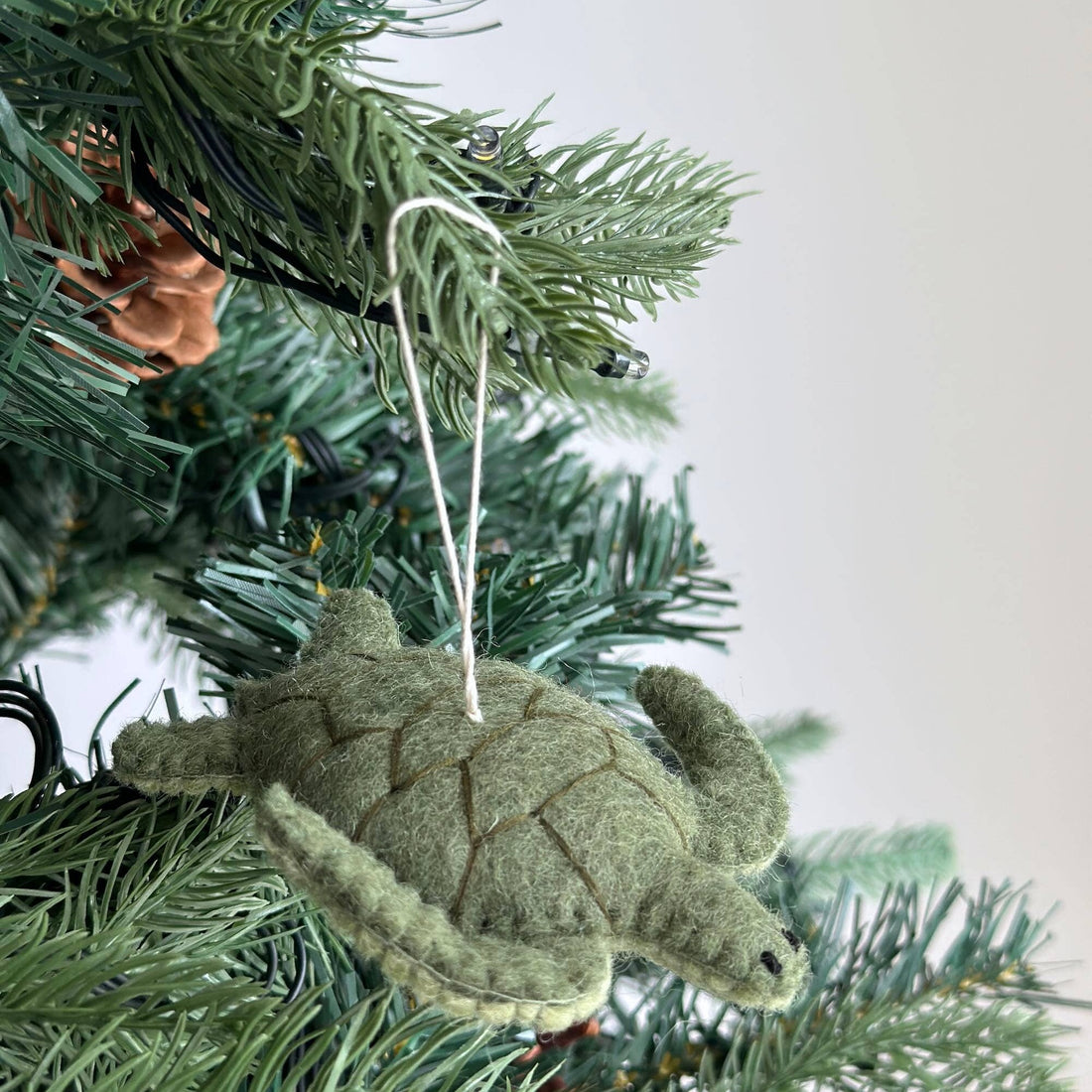 Felt Ornament - Sea Animals Theme / Sea Turtle, a wool felt ornament by Ganapati Crafts Co., needle-felted and hand-stitched in Nepal