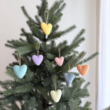 Felt Pastel Heart Ornaments – Set of 7 Wool Decorations, a wool felt ornament by Ganapati Crafts Co., needle-felted and hand-stitched in Nepal (view 2) · view 2