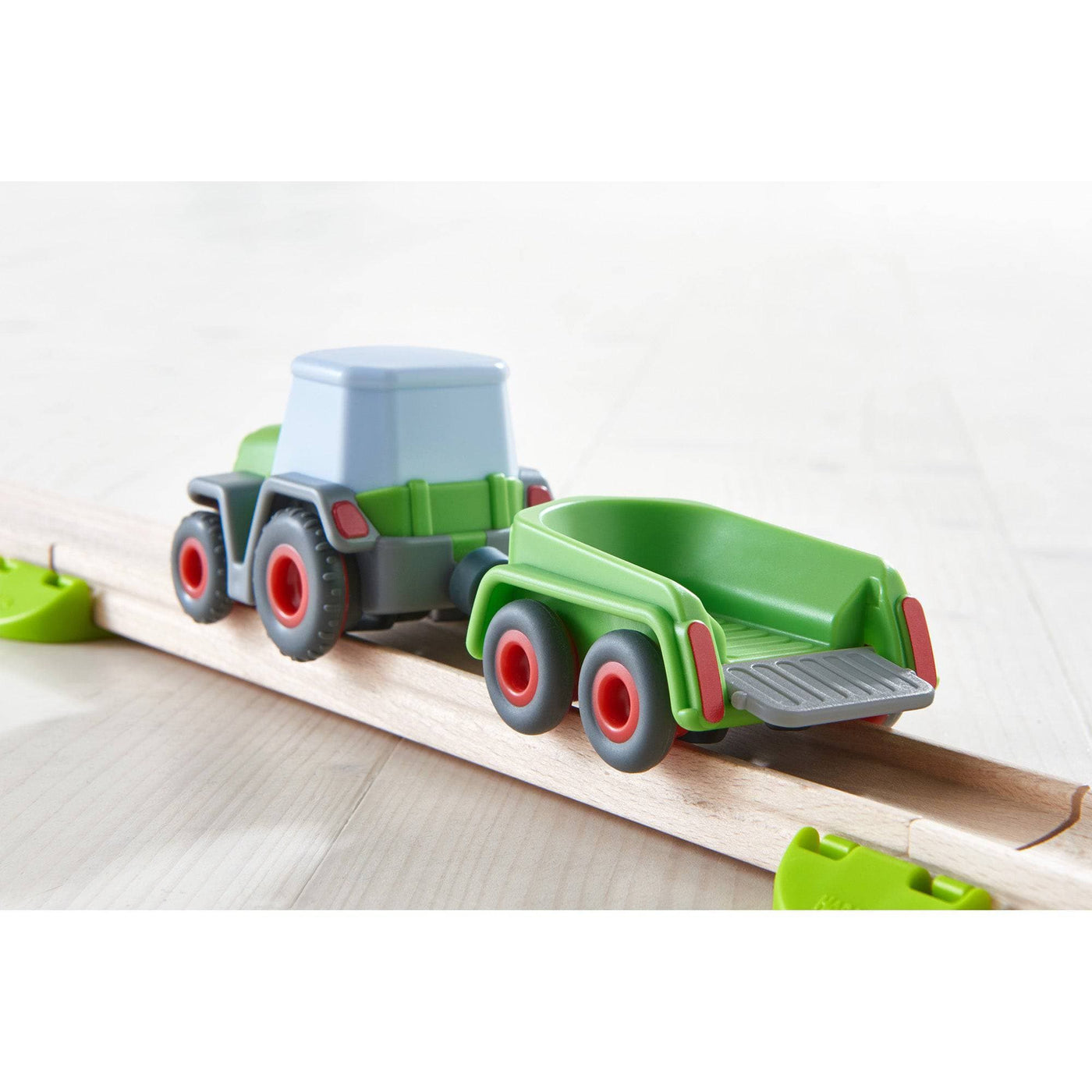 HABA Kullerbu Tractor and Trailer with Momentum Motor