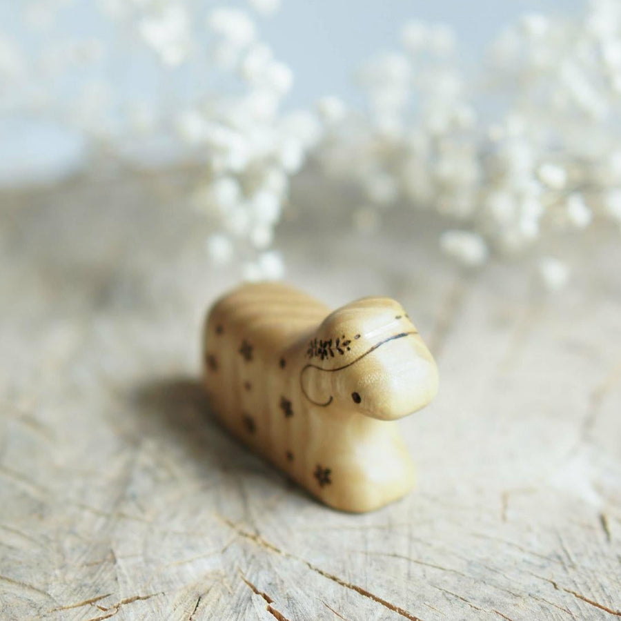 Wooden Lamb, Lying