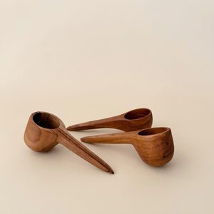 Three hand-carved teak mini scoops