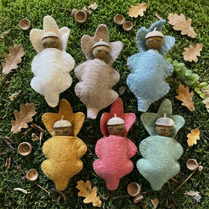 Acorn Babies, six felt babies in oak-leaf swaddles