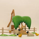 Second view of the wooden willow tree showing the trunk and base · view 2